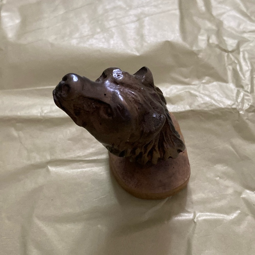 Small bear head figurine